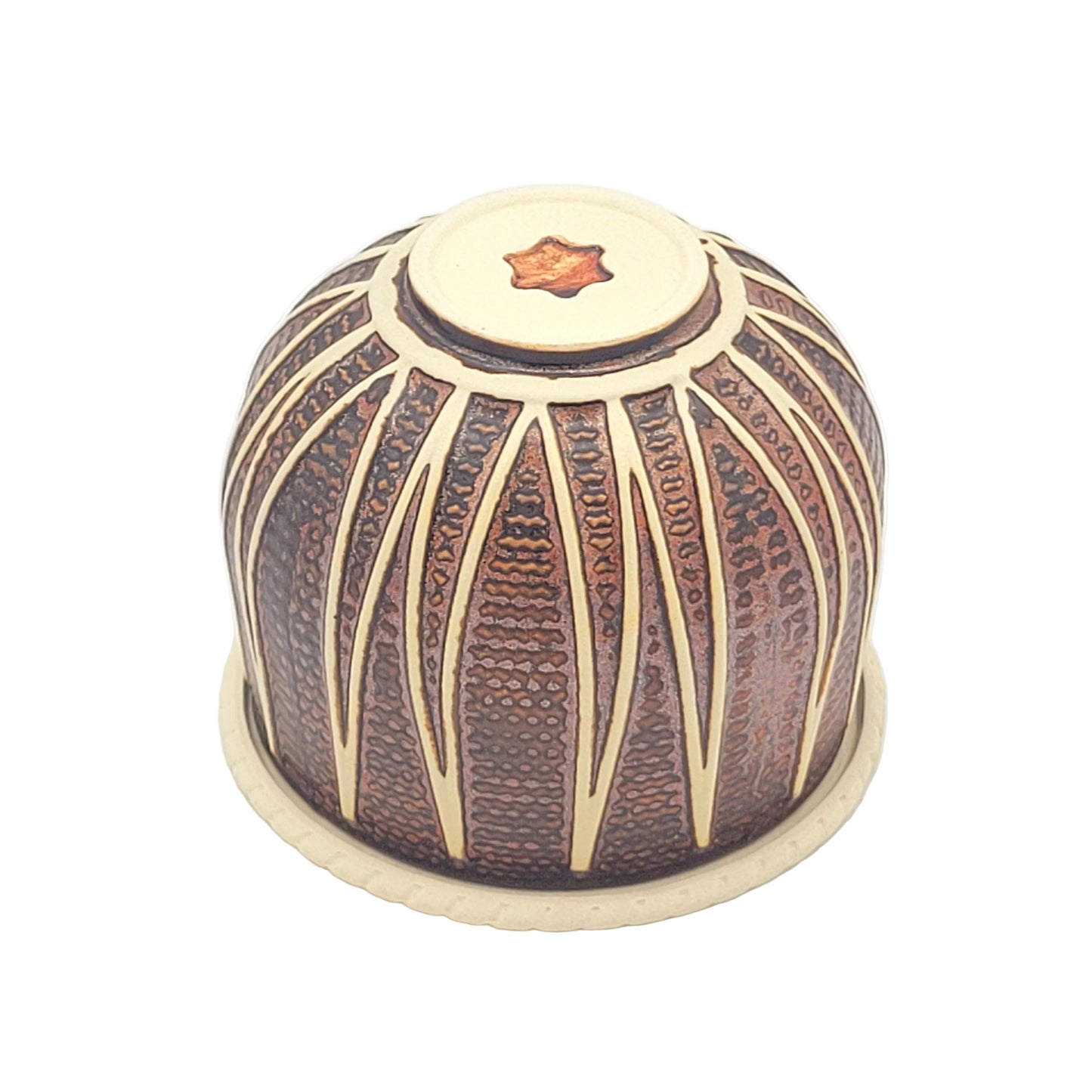 A small tabla bass drum  ceramic bowl with copper colored glaze. photographed on a plain white background.